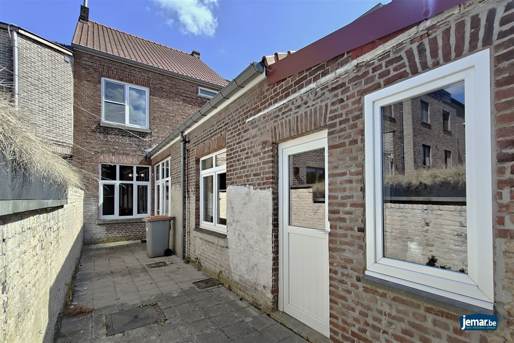 Gerenoveerd pand met 5 slpk. en stadstuin in het centrum van Lanaken