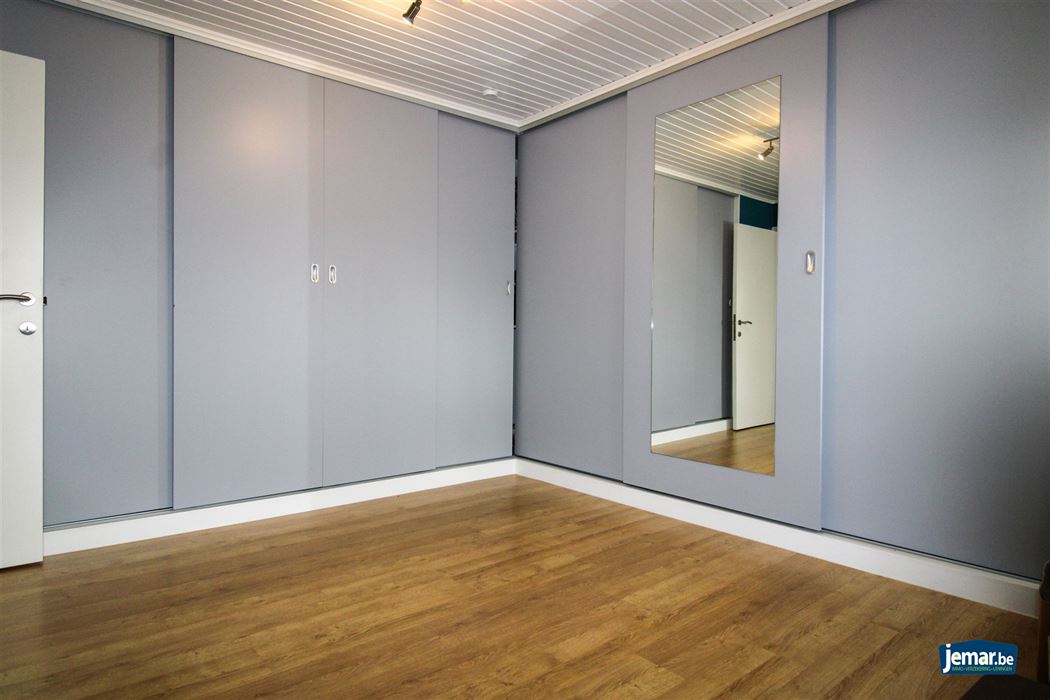 Instapklare en perfect onderhouden woning met 3 slaapkamers, 2 badkamers en een prachtige tuin van 6a74ca  in hartje Maasmechelen!