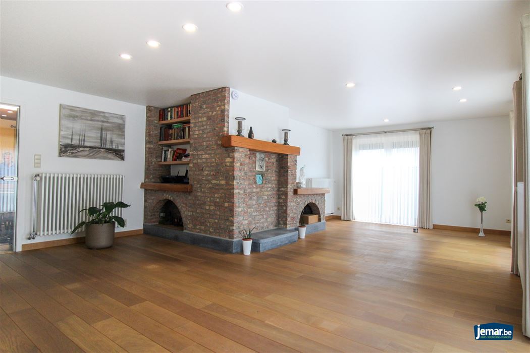 Instapklare en perfect onderhouden woning met 3 slaapkamers, 2 badkamers en een prachtige tuin van 6a74ca  in hartje Maasmechelen!