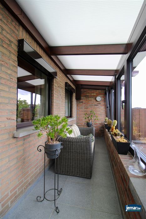 Instapklare en perfect onderhouden woning met 3 slaapkamers, 2 badkamers en een prachtige tuin van 6a74ca  in hartje Maasmechelen!