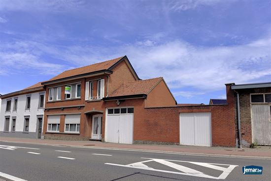 Goed onderhouden woning met 3 slpk. en 2 ingangen in Mopertingen