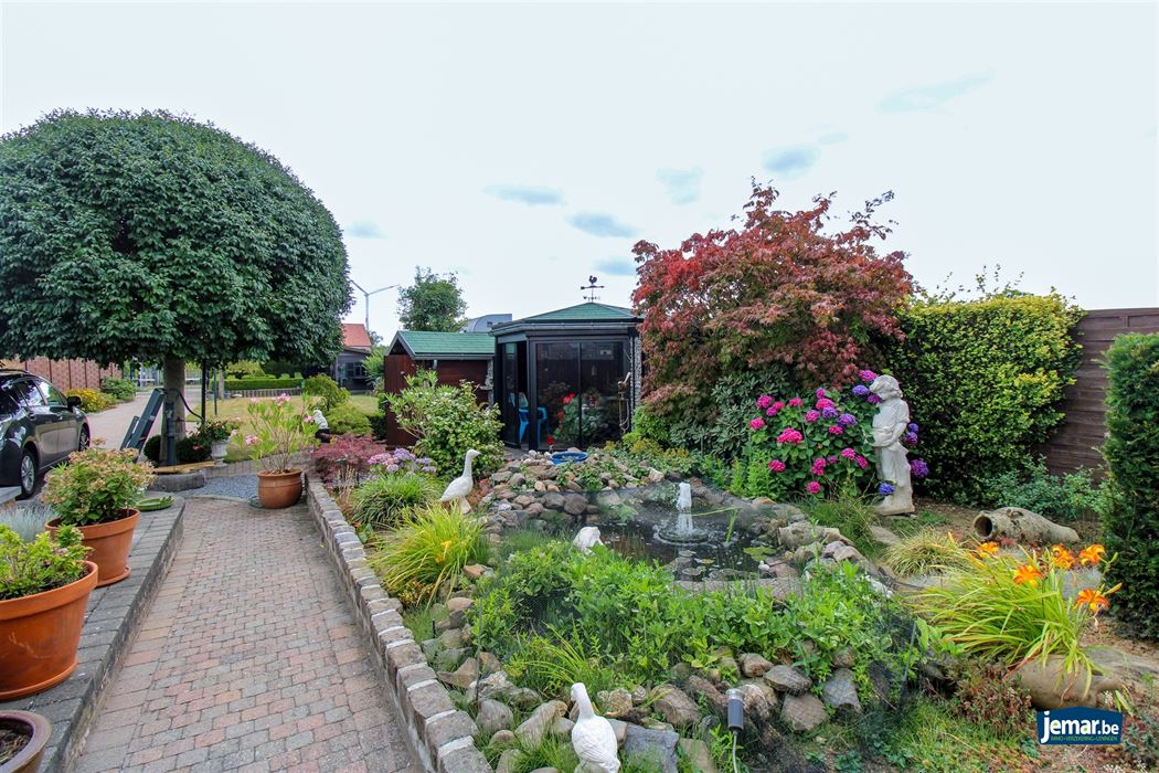 Instapklare en perfect onderhouden woning met 3 slaapkamers, 2 badkamers en een prachtige tuin van 6a74ca  in hartje Maasmechelen!