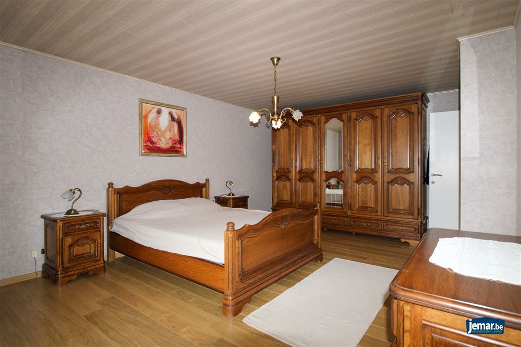 Instapklare en perfect onderhouden woning met 3 slaapkamers, 2 badkamers en een prachtige tuin van 6a74ca  in hartje Maasmechelen!