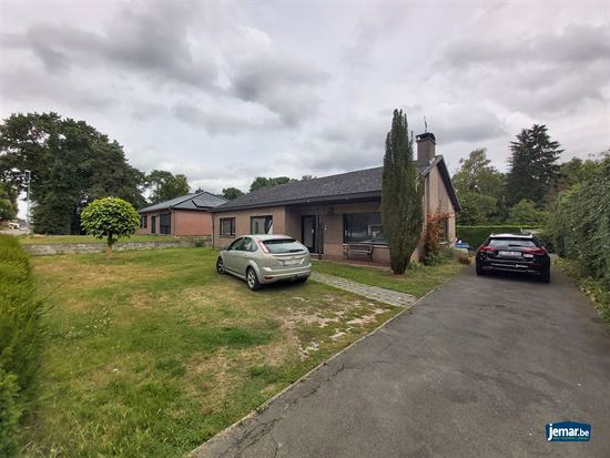 Gelijkvloerse woning met 3 slaapkamers op ruim perceel van 10are in Maasmechelen!