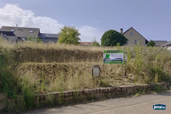 Bouwgrond met goedgekeurde plannen voor open bebouwing (4a36ca) in het landelijke Genoelselderen