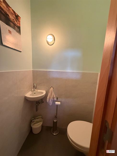 Appartement met tuin en garage 