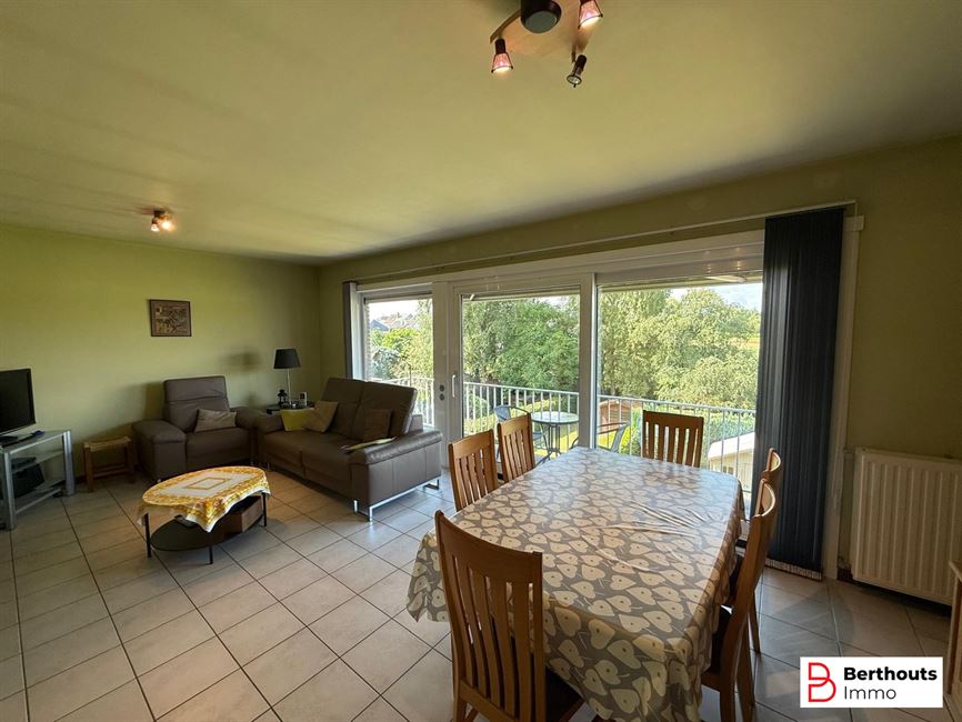 Appartement met tuin en garage 