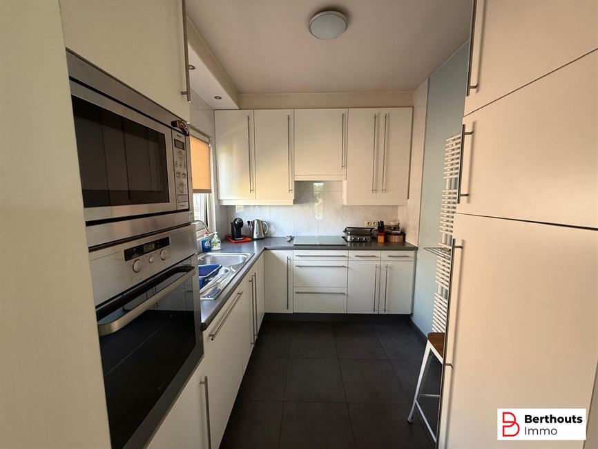 Appartement met tuin en garage 