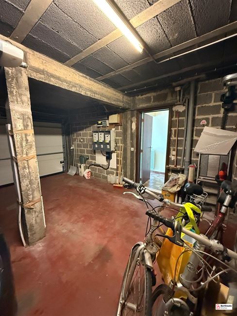 Appartement met tuin en garage 