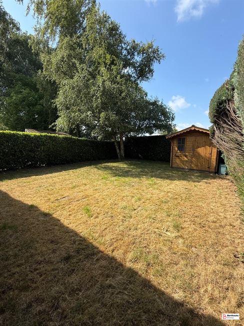 Appartement met tuin en garage 