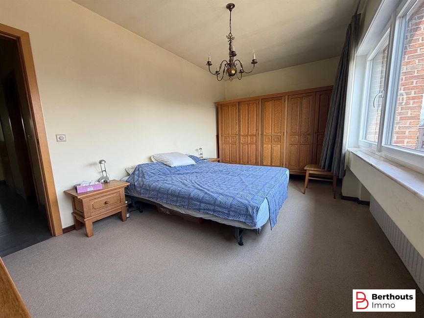 Appartement met tuin en garage 