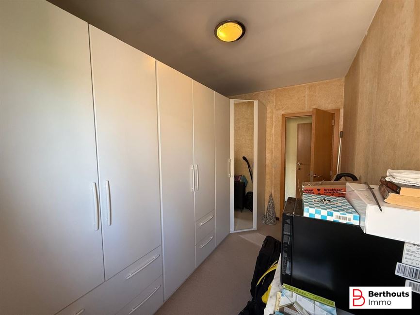 Appartement met tuin en garage 