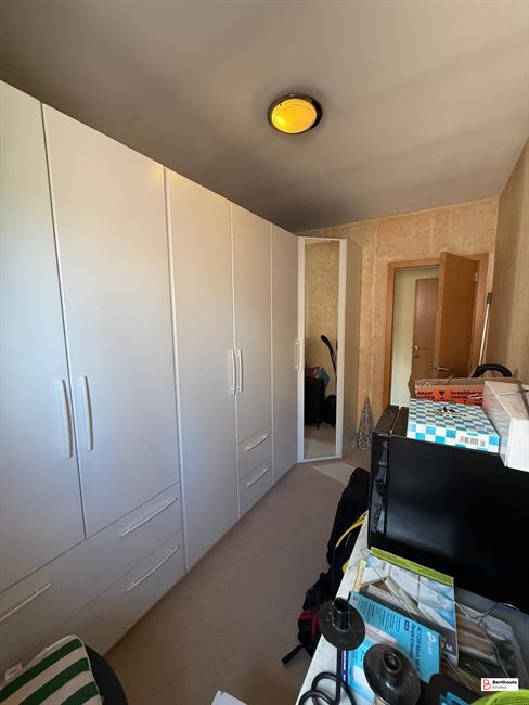 Appartement met tuin en garage 