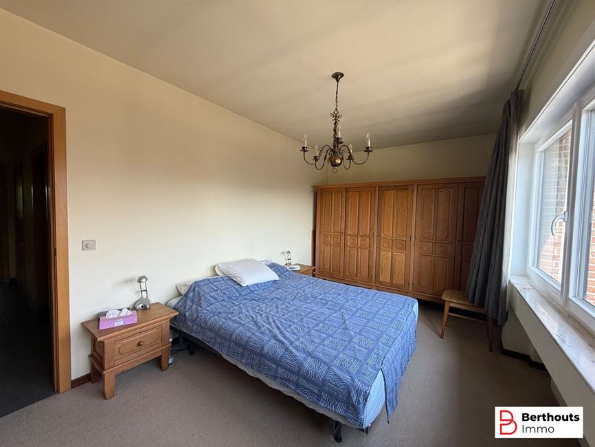 Appartement met tuin en garage 