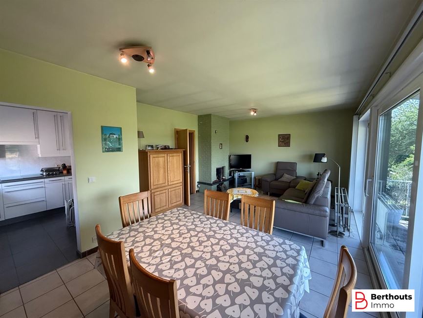 Appartement met tuin en garage 