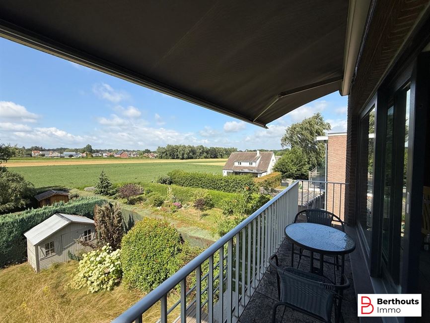 Appartement met tuin en garage 