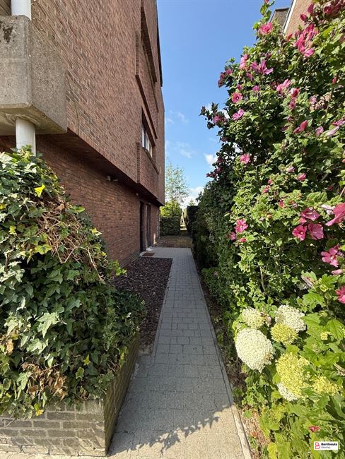 Appartement met tuin en garage 