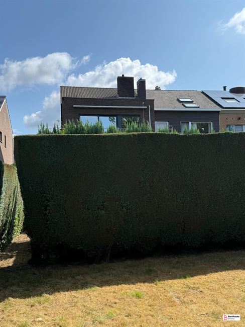Appartement met tuin en garage 