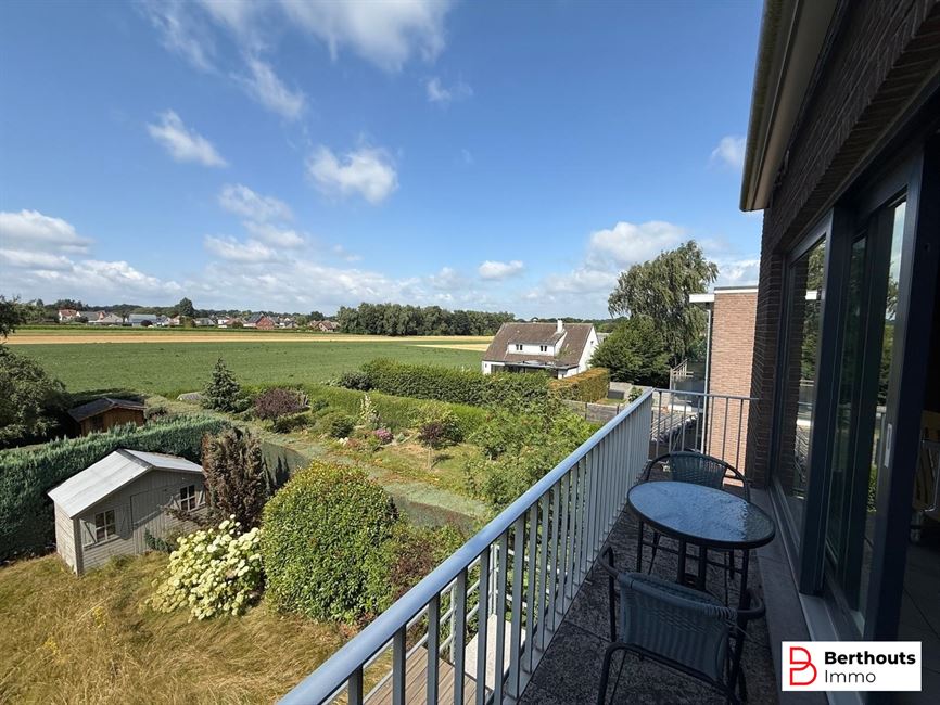 Appartement met tuin en garage 