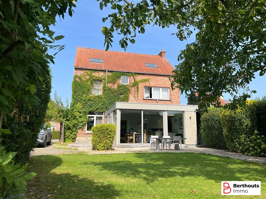 Herenhuis met prachtige tuin 