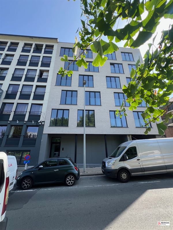 Opbrengsteigendom met 10 appartementen 14 parkings /14 kelders