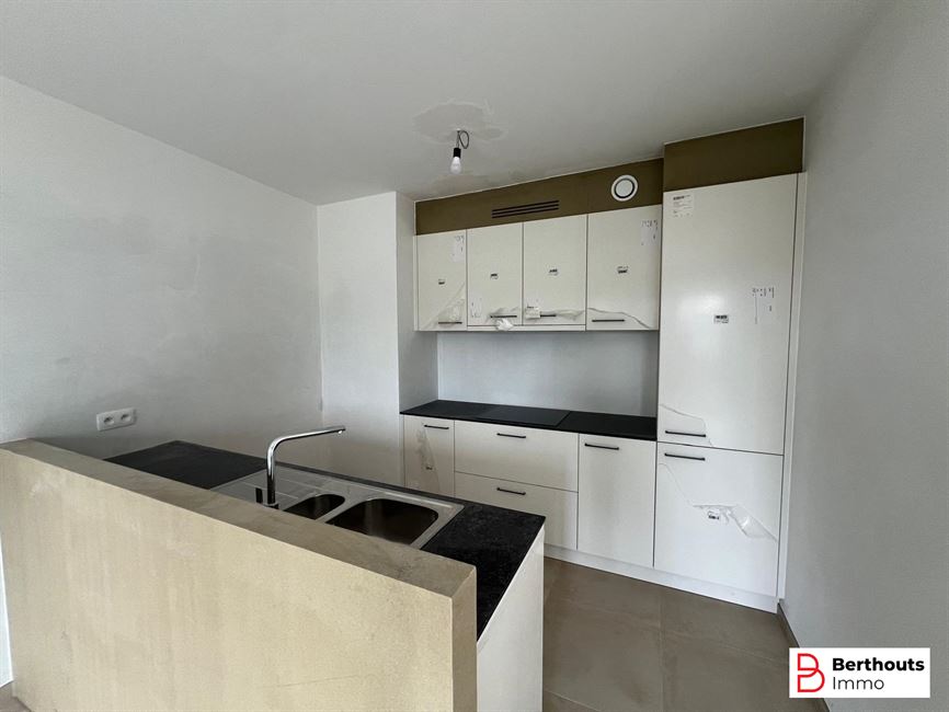 Opbrengsteigendom met 10 appartementen 14 parkings /14 kelders