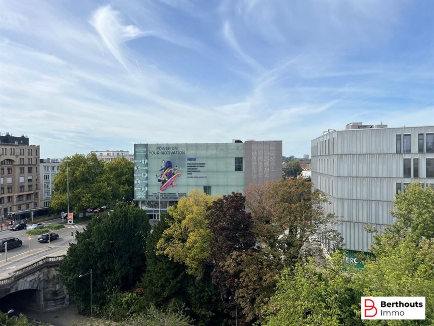 Opbrengsteigendom met 10 appartementen 14 parkings /14 kelders