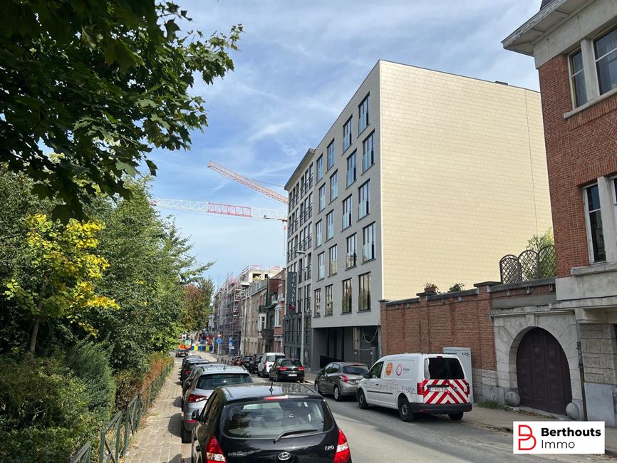 Opbrengsteigendom met 10 appartementen 14 parkings /14 kelders