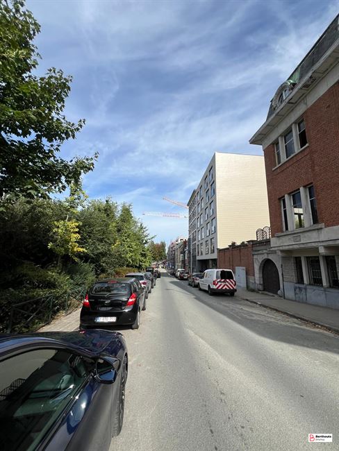Opbrengsteigendom met 10 appartementen 14 parkings /14 kelders