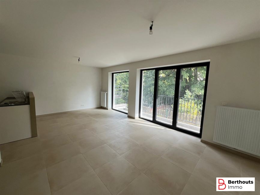 Opbrengsteigendom met 10 appartementen 14 parkings /14 kelders