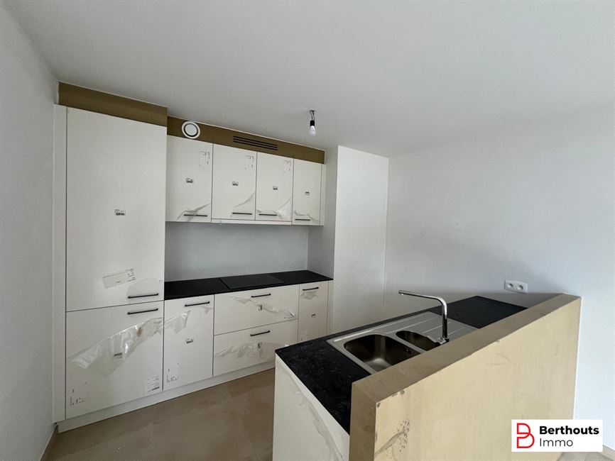 Opbrengsteigendom met 10 appartementen 14 parkings /14 kelders