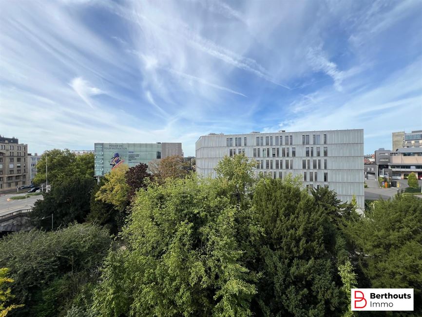 Opbrengsteigendom met 10 appartementen 14 parkings /14 kelders