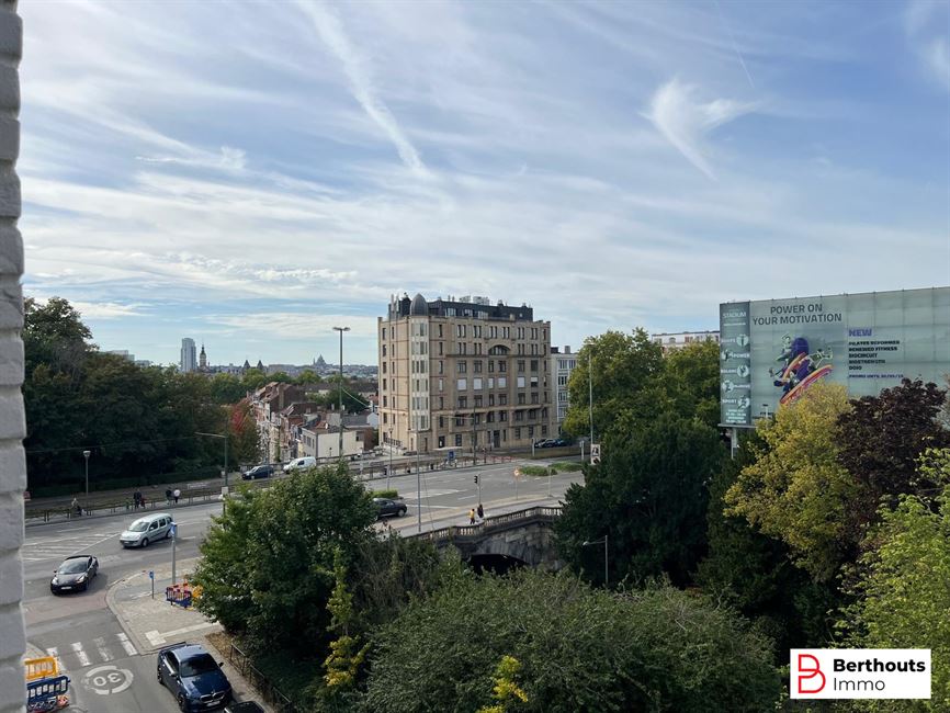 Opbrengsteigendom met 10 appartementen 14 parkings /14 kelders