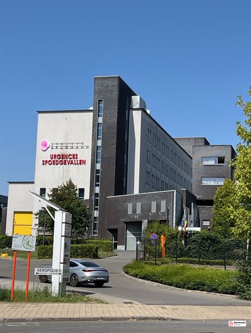 Opbrengsteigendom met 10 appartementen 14 parkings /14 kelders