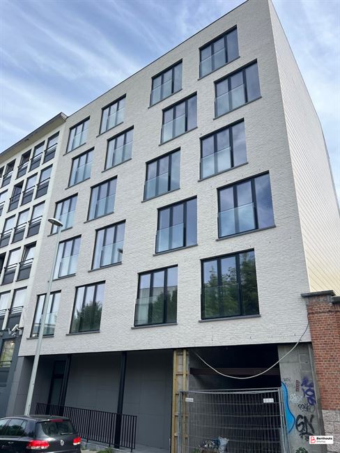 Opbrengsteigendom met 10 appartementen 14 parkings /14 kelders